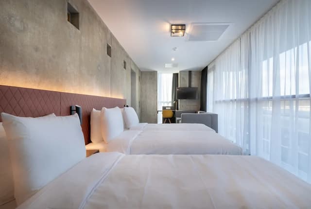 ホテル ニュー キット-デザイン トリプルルーム シングルベッド 3 台-1