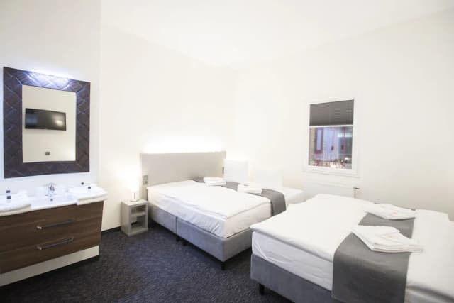 Narodni Stay-Deluxe Quadruple Room Atrium View-3