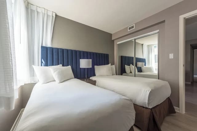 Carmana Hotel & Suites-Standard 2-Bedroom Suite (1 King + 2 Twins)-6