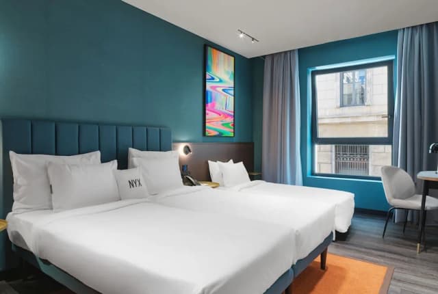 NYX Esperia Palace Hotel Athens-Deluxe Space Triple Room-6