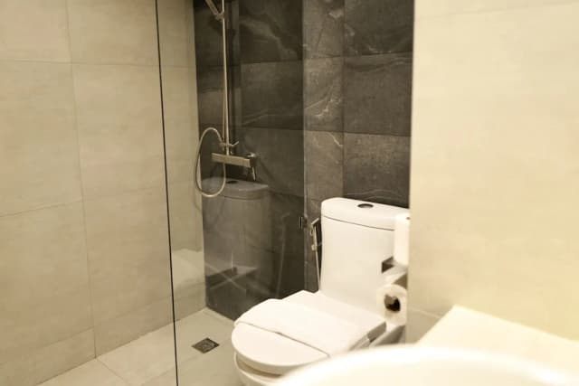 ヘルマン・ホテル・パタヤ-Ocean Triple Room-9