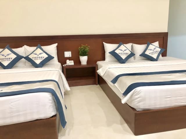 Victory Airport Hotel-Deluxe Quadruple Room, Multiple Beds, Balcony-3