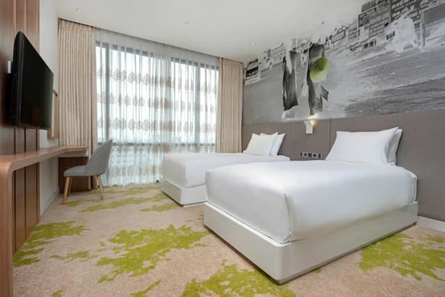 ホリデイ イン & スイーツ サイゴン エアポート by IHG-スタンダード ルーム シングルベッド 2 台 プールビュー-2
