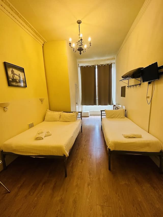 朗斯黛爾酒店-基本三人房 (Shared Bathroom)-1