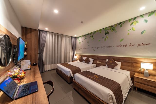 Thanh Long Hotel-Family Triple Room-1