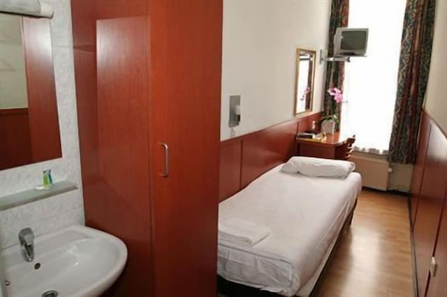 호텔 컨티넨탈 암스테르담-베이직 싱글룸, 싱글침대 1개, 공용 욕실-1