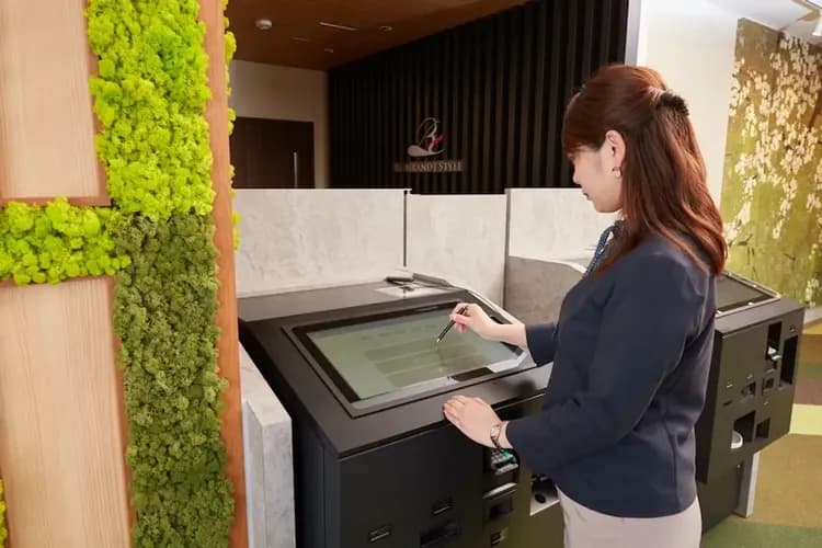 Check-in/check-out kiosk