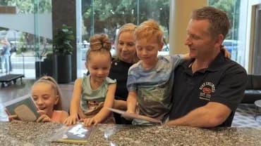 Check-in/check-out kiosk