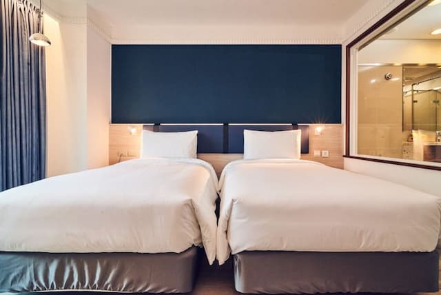 雀客藏居台北南港｜近環球購物中心＆CITYLINK、全新裝潢-經典雙床客房-2