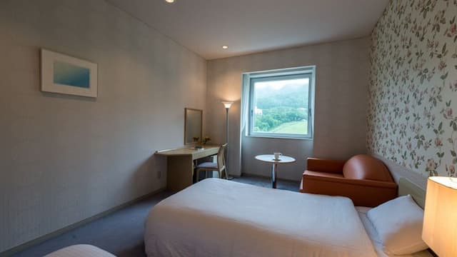 [Mountain View Twin] Located on the 6th floor and above, this Western-style room offers a beautiful view of Zao.