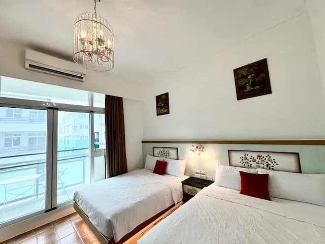 墾丁包棟民宿-童話民宿｜BBQ、電動麻將桌、音響設備、最高22人包棟-8人3房包棟（雙人房*2+四人房*1）-11