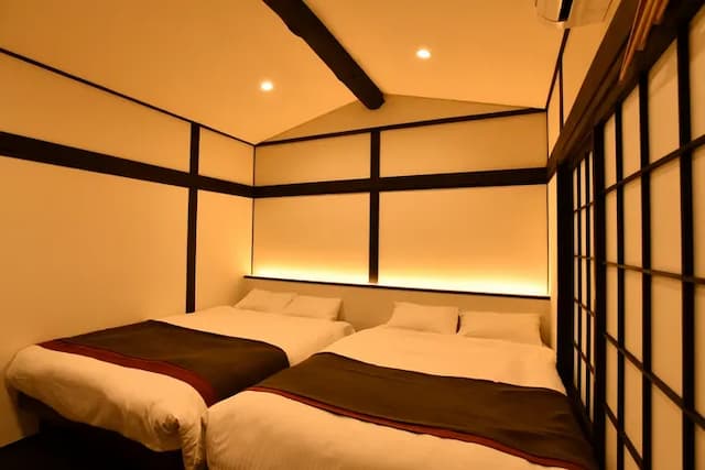 臥室２提供有兩張標準雙人床（1.4米寛 x 2米長）