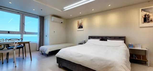 Sitting at the table looking at the sea, relaxing a cup of coffee...