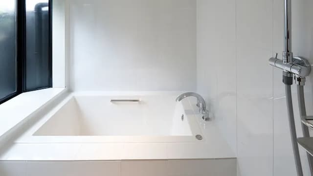 Main building with indoor bath