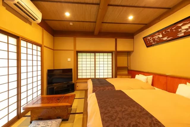 14㎡のベッドルーム（テレビはスマートテレビ（50型））