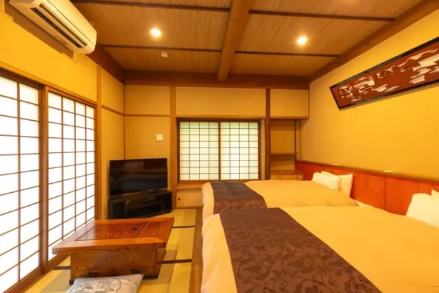 14㎡のベッドルーム（テレビはスマートテレビ（50型））