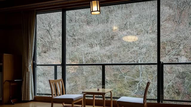 View from the wide edge on the mountain stream side of the new building around winter