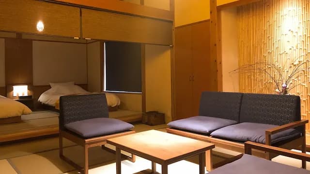 [Annex 53㎡] A guest room with an open-air bath that flows directly from the source. A modern building with a high ceiling and a sense of openness (example)