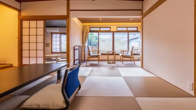 Japanese-style room with 12 tatami mats, twin bed and a bed. *This room type is located on the second floor of the building.