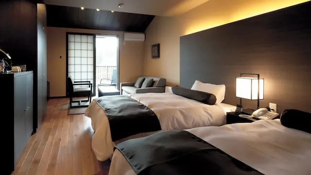 Rest in a double bed in a spacious bedroom.