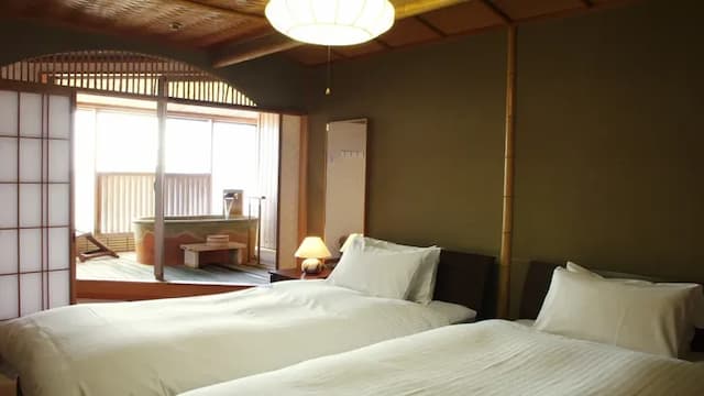 Japanese-Western style room with 100% open-air bath from the source ②