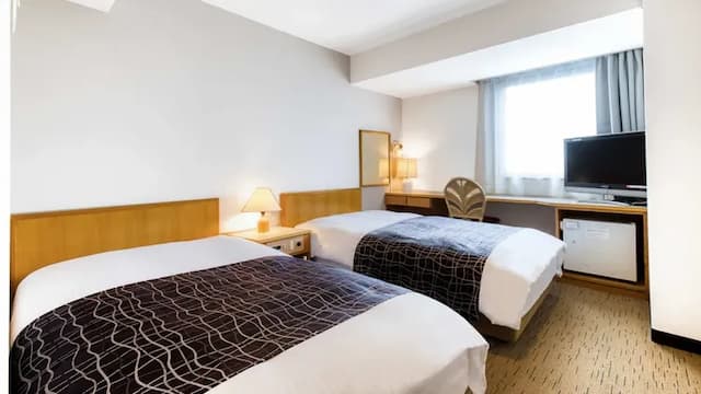 APA飯店 丸龜站前大通 |  丸龜站步行 7 分鐘-雙床房【不挑房】-1