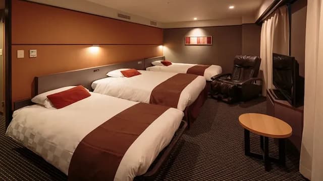 Superior triple room with massage chair