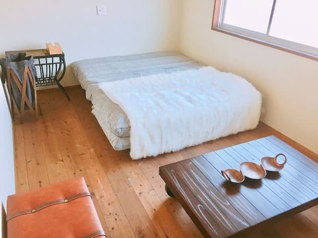 洋室（クイーンサイズソファーベッド）