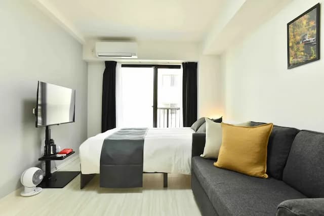 FL民宿 日本橋｜浪速區/車站步行6分/1 至 4 人/一線直達京都/40 吋電視+Netflix-位於大阪充滿活力的浪速區的舒適公寓，車站步行6分鐘，可供 1 至 4 人入住，配備 40 吋電視（可收看 Netflix）-2