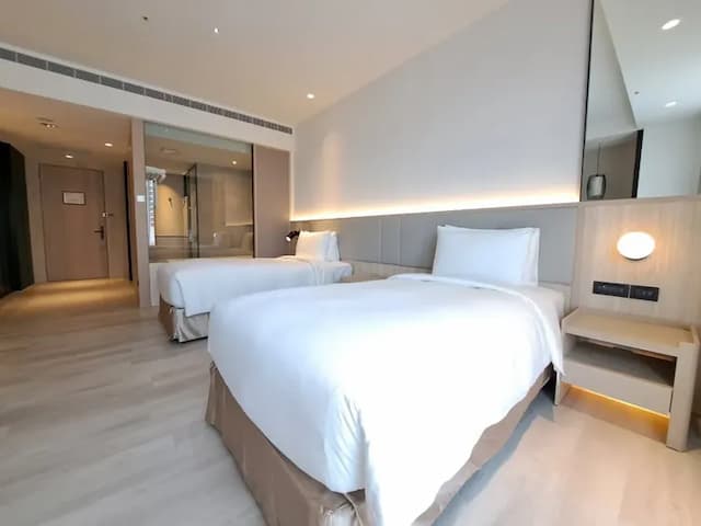 Boutech Wuri Village Hotel-Deluxe Twin Room-1