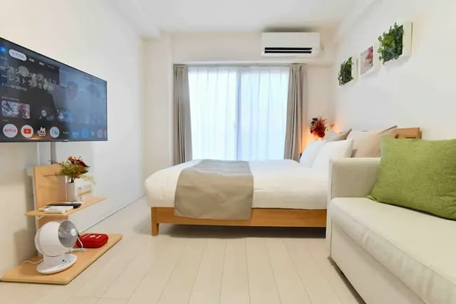 FL民宿 日本橋｜浪速區/車站步行6分/1 至 4 人/一線直達京都/40 吋電視+Netflix-位於大阪充滿活力的浪速區的舒適公寓，車站步行6分鐘，可供 1 至 4 人入住，配備 40 吋電視（可收看 Netflix）-1