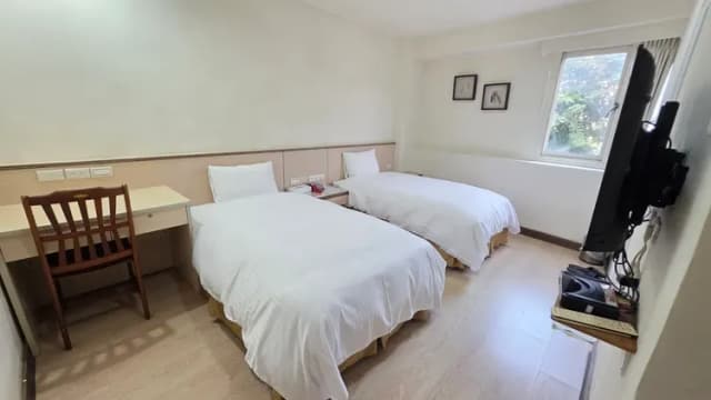 老爺商務旅館-樸實兩小床-1