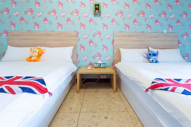 아이즈 딤 스위트 삼다관 (Eyes Theme Suites Sanduo Museum)-Standard Quadruple Room with Balcony-1