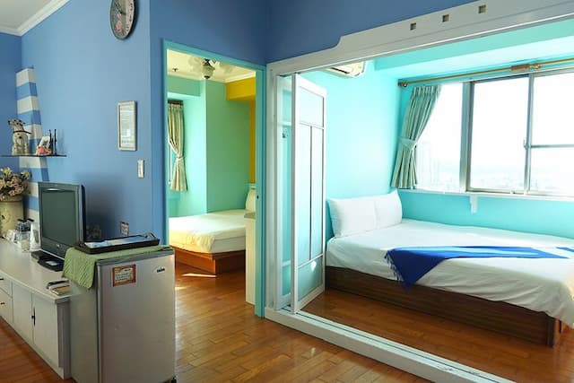아이즈 딤 스위트 삼다관 (Eyes Theme Suites Sanduo Museum)-Deluxe Family 6-Bed Room - 3 Beds with Balcony-1