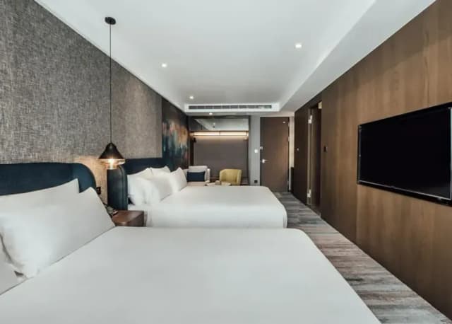 【High Speed Rail Holiday】2-day free travel at Kaohsiung Junyi Hotel-Deluxe Quad (Breakfast included)-1