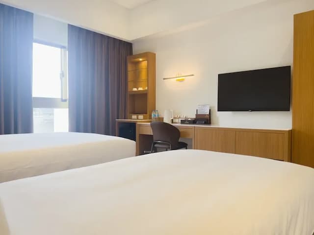 Mille Rich Hotel-Deluxe Triple Room-5