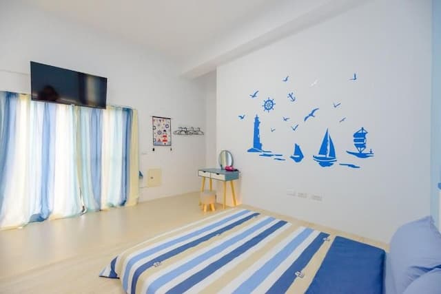 黃金海岸民宿 | 18-28人可澎湖包棟 | 可選購海景房 | 隘門沙灘-經濟四人房-5