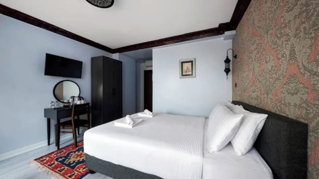 미트라 호텔-디럭스 트리플룸-5