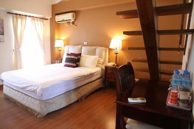 Champs Elysées Garden Homestay-Attic Quadruple Room-1