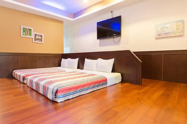 興吉木屋 - 墾丁大街只要走路7分鐘!| 室內公共空間自行車停放-木屋雙衛浴十二人房-4